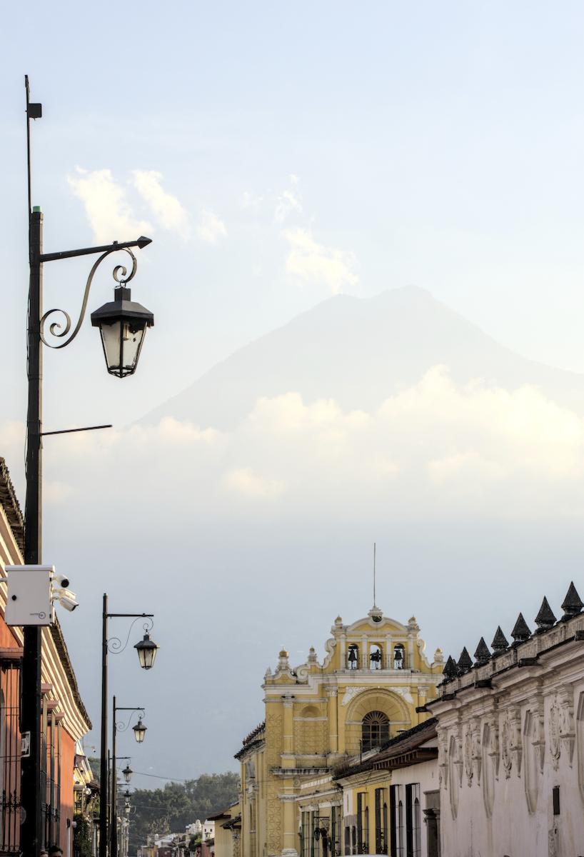 Antigua church with volcano